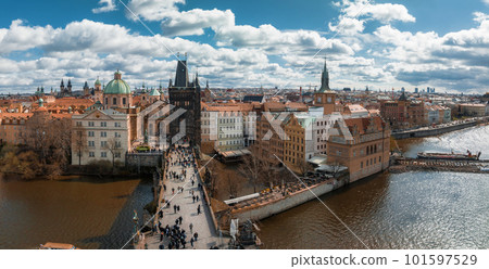 Scenic spring panoramic aerial view of the Old Town pier architecture and Charles Bridge over Vltava river in Prague, Czech Republic Scenic spring panoramic aerial view of the Old Town pier architecture and Charles Bridge over Vltava river in Prague, Czech Republic 101597529
