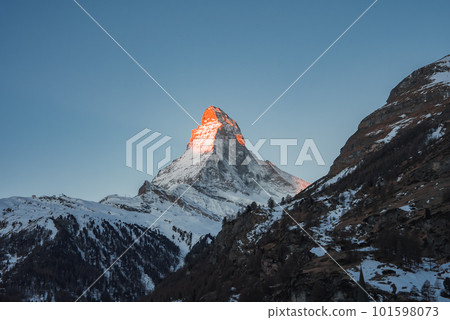 Scenic sunrise or sunset view of Matterhorn - one of the most famous and iconic Swiss mountains, Zermatt, Valais, Switzerland Scenic sunrise or sunset view of Matterhorn - one of the most famous and iconic Swiss mountains, Zermatt, Valais, Switzerland 101598073