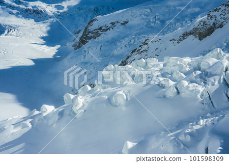 Magica view of the Alps mountains in Switzerland. View from helicopter in Swiss Alps. Mountain tops in snow. Breathtaking view of Jungfraujoch and the UNESCO World Heritage - the Aletsch Glacier Magica view of the Alps mountains in Switzerland. View from helicopter in Swiss Alps. Mountain tops in snow. Breathtaking view of Jungfraujoch and the UNESCO World Heritage - the Aletsch Glacier 101598309