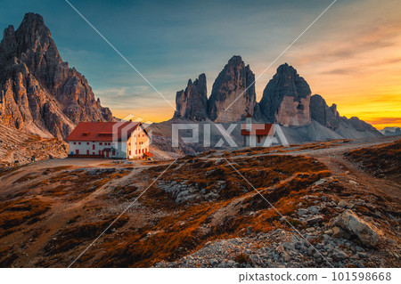 Majestic Tre Cime di Lavaredo peaks at sunset, Dolomites, Italy 101598668
