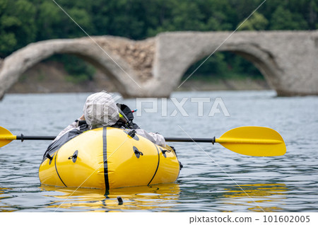 person sleeping on packraft 101602005