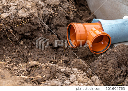 plastic pvc waste sewer pipe in the ground. construction site 101604763