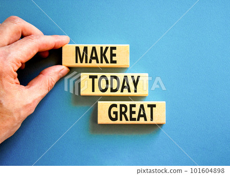 Motivation and Make today great symbol. Concept words Make today great on wooden blocks on a beautiful blue table blue background. Businessman hand. Business and make today great concept. Copy space 101604898
