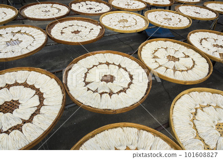 Close-up of traditional handmade noodle-making drying outdoors in Guanmiao, Tainan, Taiwan. Close-up of traditional handmade noodle-making drying outdoors in Guanmiao, Tainan, Taiwan. 101608827
