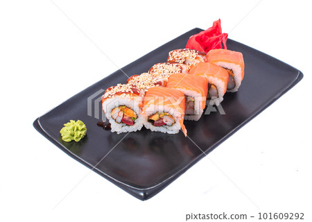 Japanese seafood Sushi roll isolated on white close up. Japanese food restaurant, sushi maki gunkan roll plate or platter set. Maki Sushi rolls with salmon and avocado. Sushi isolated at white Japanese seafood Sushi roll isolated on white close up. Japanese food restaurant, sushi maki gunkan roll plate or platter set. Maki Sushi rolls with salmon and avocado. Sushi isolated at white 101609292