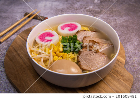 Fresh ramen noodles with garnish, pork tenderloin, eggs marinated in Mirin and soy sauce, bean Fresh ramen noodles with garnish, pork tenderloin, eggs marinated in Mirin and soy sauce, bean 101609481