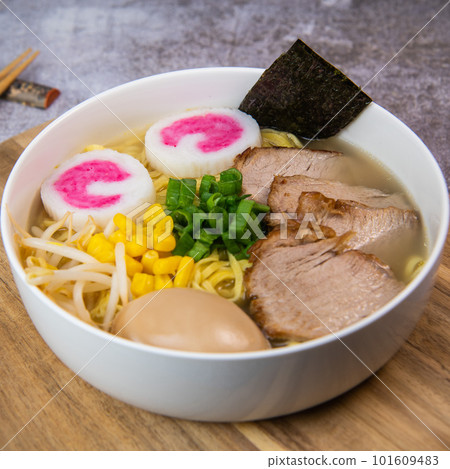 Fresh ramen noodles with garnish, pork tenderloin, eggs marinated in Mirin and soy sauce, bean Fresh ramen noodles with garnish, pork tenderloin, eggs marinated in Mirin and soy sauce, bean 101609483