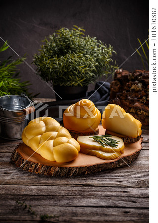 Smoked braided cheese 101610382