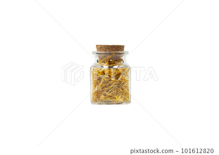 Dried Calendula or Marigold petals in a glass jar isolated on white background. 101612820