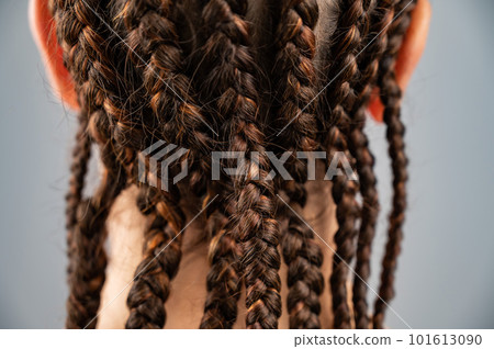 Close-up of braids on the head of a caucasian woman. 101613090