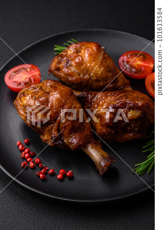 Delicious grilled chicken legs with spices and herbs in teriyaki sauce Delicious grilled chicken legs with spices and herbs in teriyaki sauce 101613584