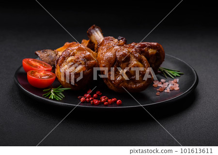 Delicious grilled chicken legs with spices and herbs in teriyaki sauce 101613611