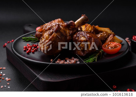 Delicious grilled chicken legs with spices and herbs in teriyaki sauce 101613618