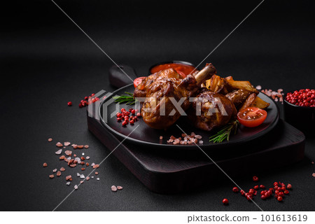 Delicious grilled chicken legs with spices and herbs in teriyaki sauce Delicious grilled chicken legs with spices and herbs in teriyaki sauce 101613619