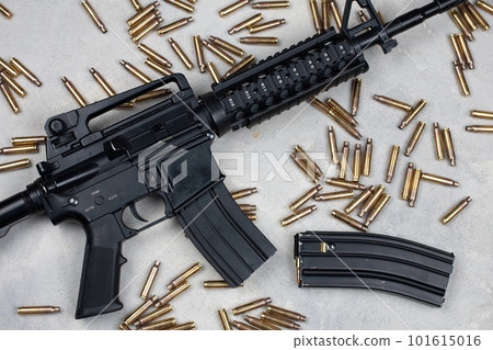M4 carbine and 5.56mm shells and magazine with bullets 101615016