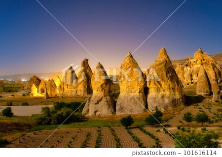 Rocks and the sky with stars. View of the rocks at night. Landscape in the summertime. 101616114