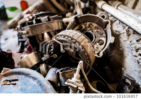 Close-up of removed old car parts in a car service.  101616957