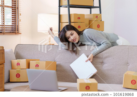 Small businesses SME owners female entrepreneurs check online orders to prepare to pack the boxes, sell to customers, sme business ideas online 101619868