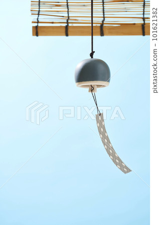 Summer blue sky and wind chimes swaying in the wind Summer blue sky and wind chimes swaying in the wind 101621382