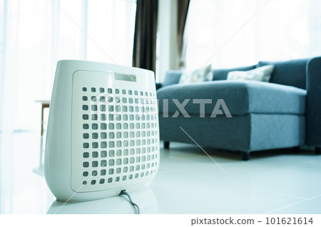 Dirty - dusty air purifier filter in living room. Air purifier machine lid or grille filter fully with a dust and polluted particle. Dirty - dusty air purifier filter in living room. Air purifier machine lid or grille filter fully with a dust and polluted particle. 101621614