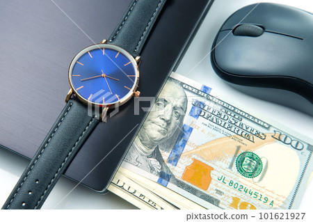 Dollars, wristwatch near laptop with mouse. Business online. Working time for working with laptop. Dollars, wristwatch near laptop with mouse. Business online. Working time for working with laptop. 101621927