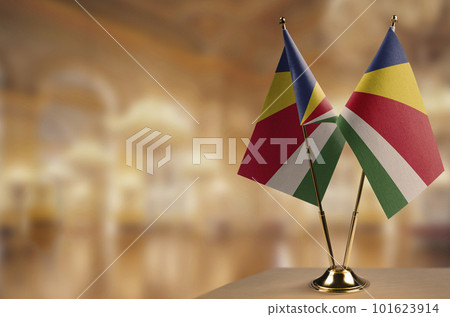 Small flags of the Seychelles on an abstract blurry background Small flags of the Seychelles on an abstract blurry background 101623914
