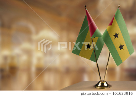 Small flags of the Sao Tome and Principe on an abstract blurry background Small flags of the Sao Tome and Principe on an abstract blurry background 101623916