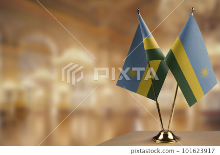 A small Rwanda flag on an abstract blurry background A small Rwanda flag on an abstract blurry background 101623917