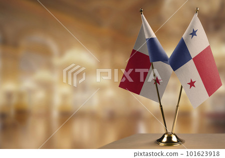 Small flags of the Panama on an abstract blurry background 101623918