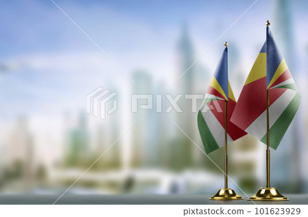 Small flags of the Seychelles on an abstract blurry background Small flags of the Seychelles on an abstract blurry background 101623929