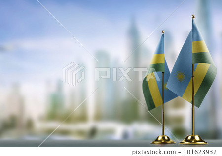A small Rwanda flag on an abstract blurry background A small Rwanda flag on an abstract blurry background 101623932