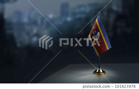Small flags of the Swaziland on an abstract blurry background Small flags of the Swaziland on an abstract blurry background 101623976