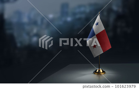 Small flags of the Panama on an abstract blurry background Small flags of the Panama on an abstract blurry background 101623979