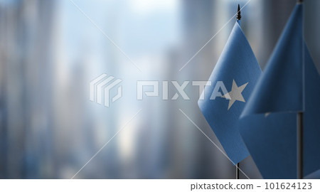 Small flags of the Somalia on an abstract blurry background 101624123