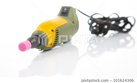 graver and drilling electric tool on a white background. dremel for processing materials 101624306