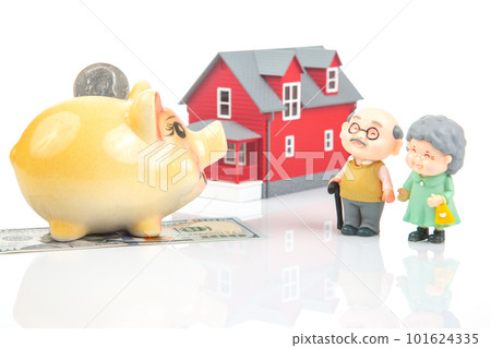 piggy bank for money and a model of a house with pensioners. 101624335