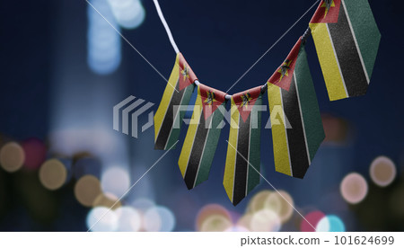 A garland of Mozambique national flags on an abstract blurred background A garland of Mozambique national flags on an abstract blurred background 101624699