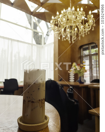 Iced coffee mocha on wooden table Iced coffee mocha on wooden table 101624966