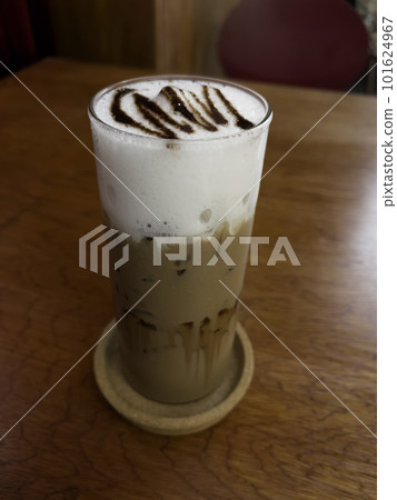 Iced coffee mocha on wooden table Iced coffee mocha on wooden table 101624967