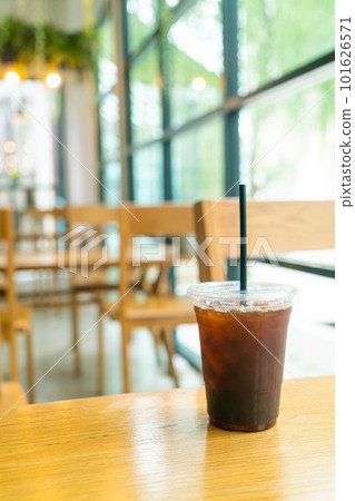 iced black coffee cup on table 101626571