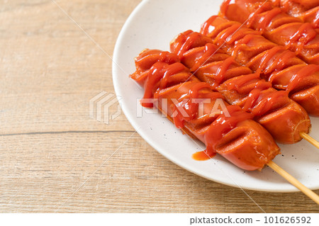 fried sausage skewer with ketchup fried sausage skewer with ketchup 101626592