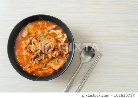Korean udon ramen noodles with pork in kimchi soup 101626737