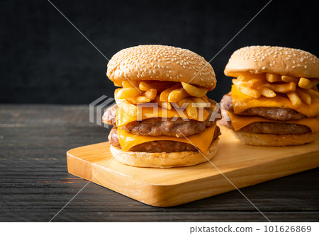 pork burger with cheese and french fries 101626869