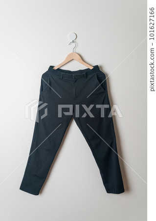trousers or long pants hanging on wall trousers or long pants hanging on wall 101627166