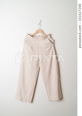 trousers or long pants hanging on wall trousers or long pants hanging on wall 101627206