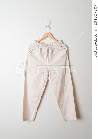 trousers or long pants hanging on wall trousers or long pants hanging on wall 101627207