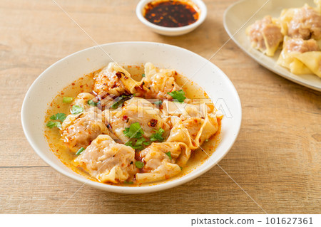 pork wonton soup or pork dumplings soup with roasted chili 101627361