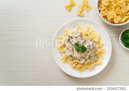 farfalle pasta with mushroom white cream sauce farfalle pasta with mushroom white cream sauce 101627382
