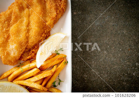 fish and chips - fried fish fillet with potatoes chips 101628206
