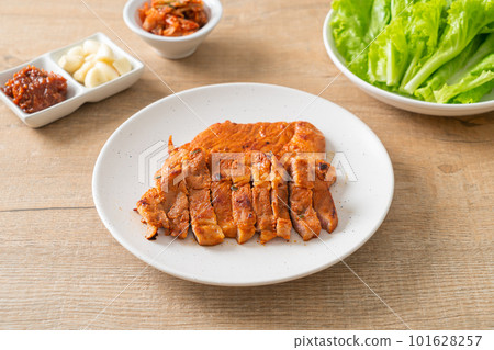 grilled pork marinated Kochujang sauce in Korean style with vegetable and kimchi grilled pork marinated Kochujang sauce in Korean style with vegetable and kimchi 101628257
